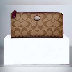 Coach Signature Canvas Zip Wallet in Brown with Burgundy Trim